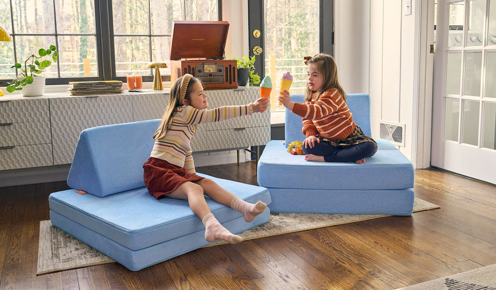 Two girls playing ice cream cone on a Bellbottom Nugget®