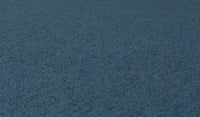 Close-up of the luxe texture of Nugget's double-brushed microsuede fabric in dark-wash denim Buckaroo.