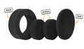 Four pieces of an all-black Chunk play ottoman lined up: one large hoop, two sturdy nesting, and one wider pad for the lid.