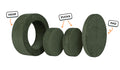 Four pieces of a forest green Chunk play ottoman lined up: one large hoop, two sturdy nesting, and one wider pad for the lid.
