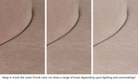 Close-up of a Chunk puck in Cottontail earthy taupe across three lighting situations. One color can present as a range of tones depending on the room.