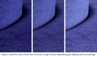 Close-up of a Chunk puck in Nebula vibrant indigo across three lighting situations. One color can present as a range of tones depending on the room.