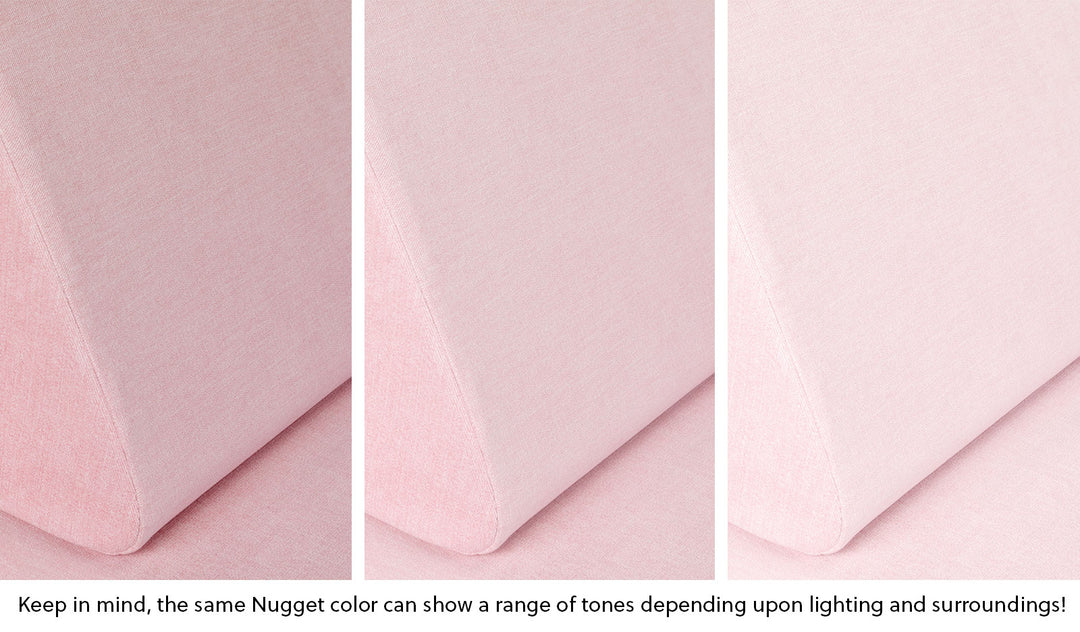 Close-up of a Nugget pillow in Heartthrob blush pink across three lighting situations. One color can present as a range of tones depending on the room.