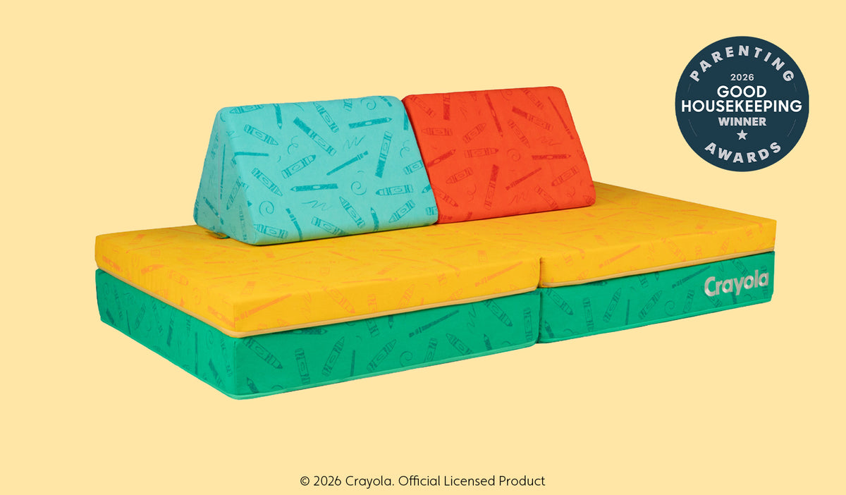 A bright, bold Crayola Nugget play couch set up in a kids' sofa configuration.