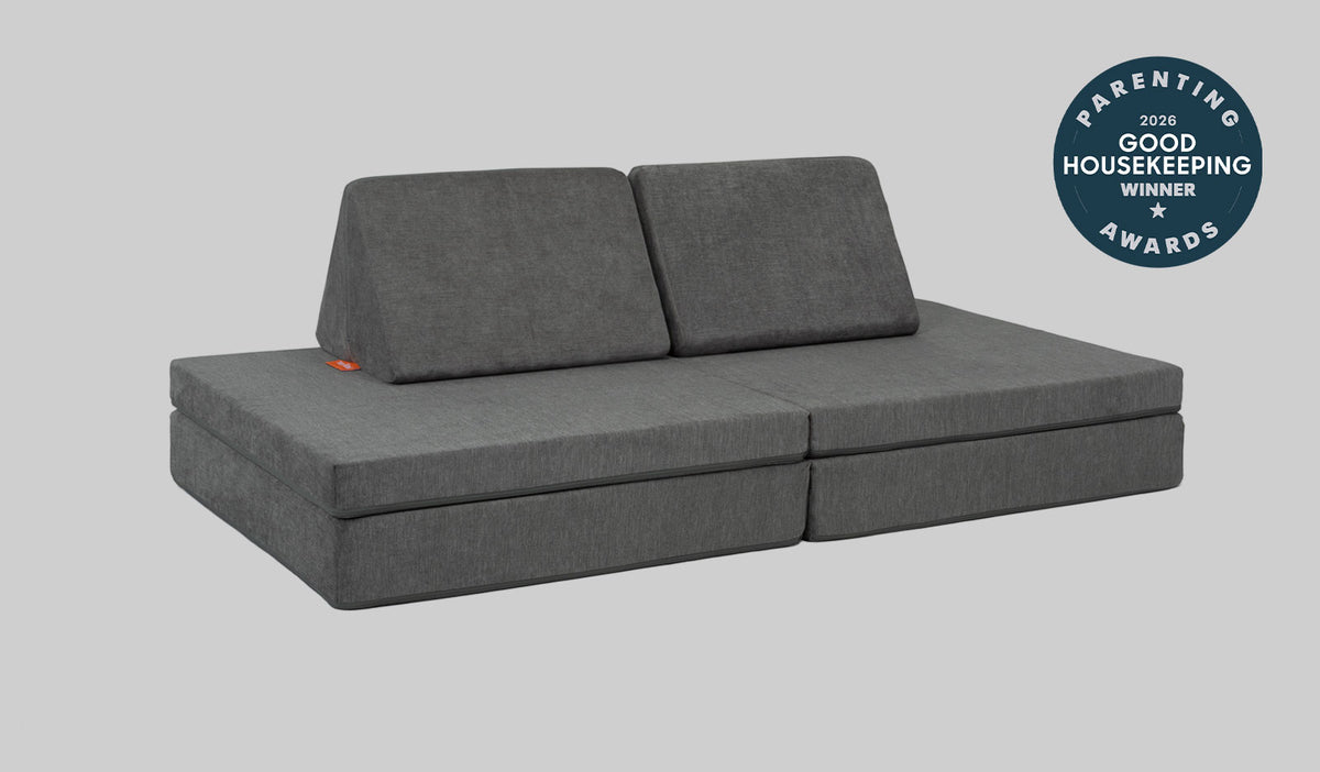 A Harbor charcoal gray Nugget play couch set up in a kids' sofa configuration.