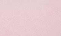 Close-up of the luxe texture of Nugget's double-brushed microsuede fabric in blush pink Heartthrob.