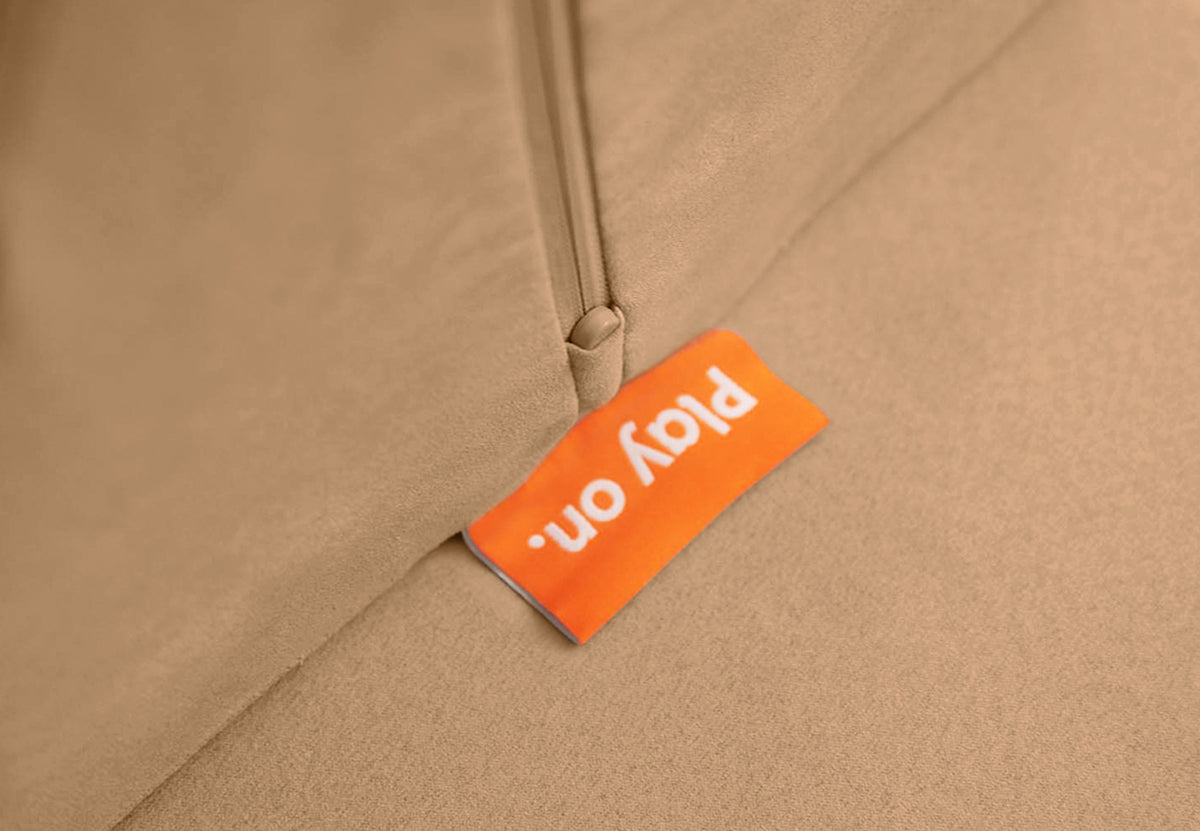Close up of Nugget tag on Sandcastle cushion