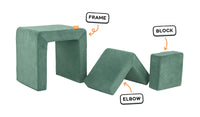 Four pieces of a sea green Smore play chair lined up: sturdy frame, one L-shaped elbow, and one square block.