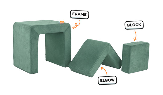 Four pieces of a sea green Smore play chair lined up: sturdy frame, one L-shaped elbow, and one square block.