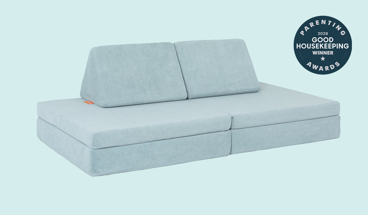 A Surfside light gray-blue Nugget play couch set up in a kids' sofa configuration.