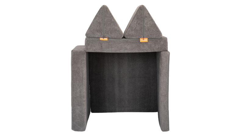 A classic Nugget fort build is ready for creativity — made using one charcoal gray Nugget play couch.