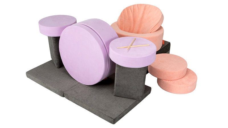 Two Chunk play ottomans and one Nugget play couch form an elaborate drumkit, ready for some rock ‘n’ roll.