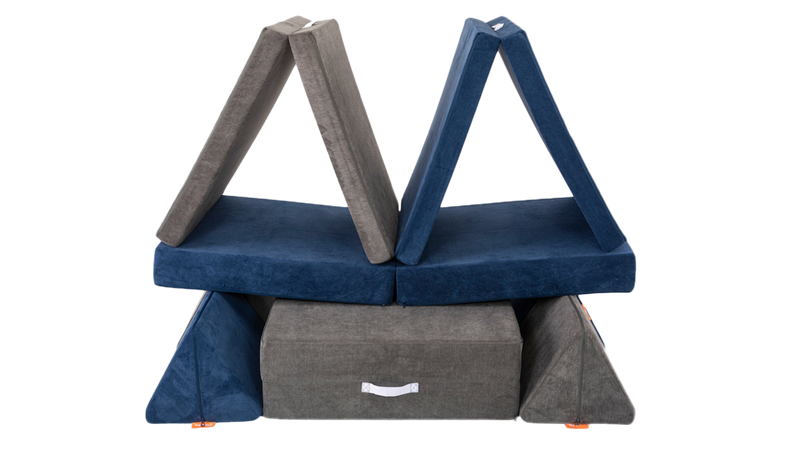 Two Nugget play couches are arranged as a fun fort with two separate rooms for imaginative play.