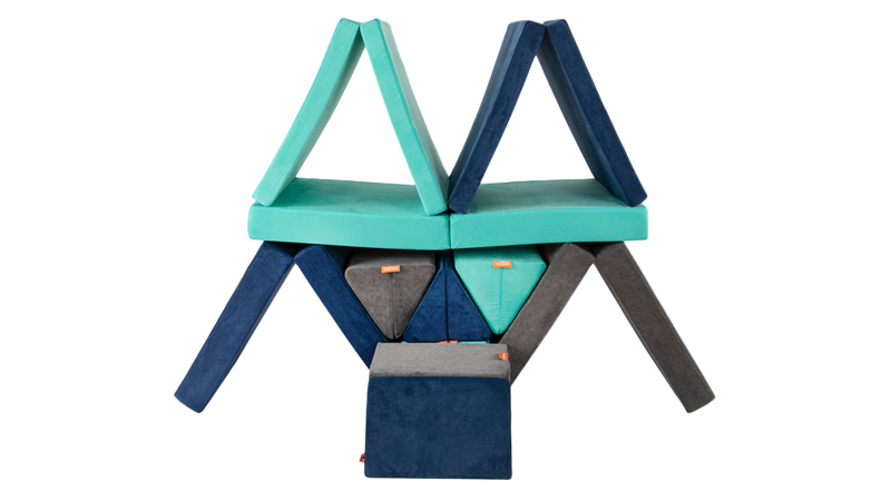 Three Nugget play couches form a fun beehive build, ready for creativity and open-ended play.