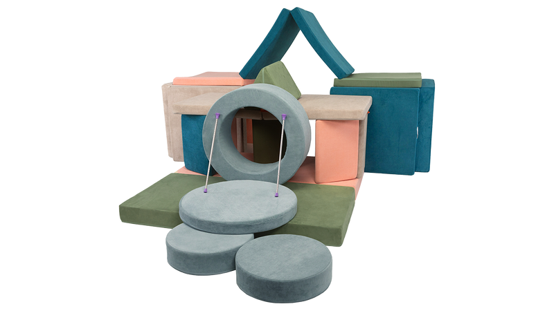 Four Nugget play couches are combined with a Chunk play ottoman to create an epic & imaginative castle play furniture-build.