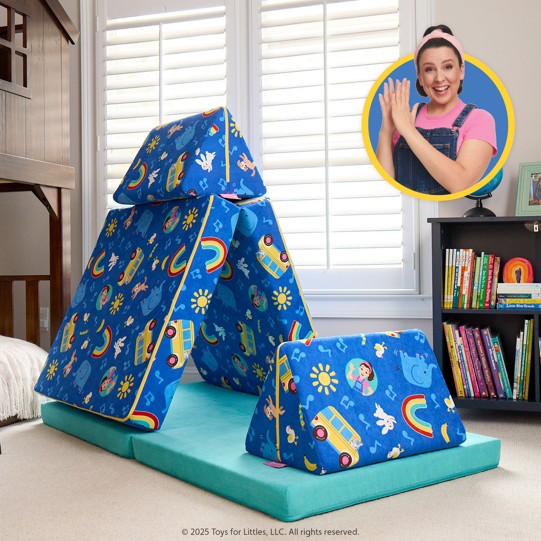 A colorful Ms. Rachel Nugget play couch is shown set up as a fort with an inset of Ms. Rachel clapping and smiling.
