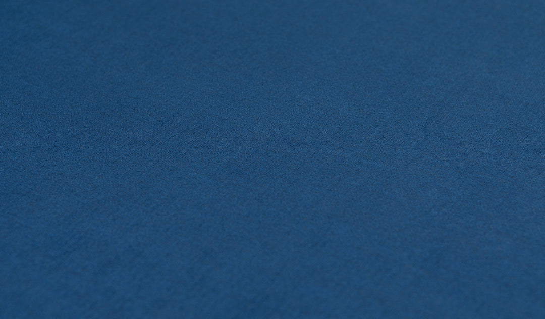 Close-up of the luxe texture of Nugget's double-brushed microsuede fabric in navy blue Blueridge.