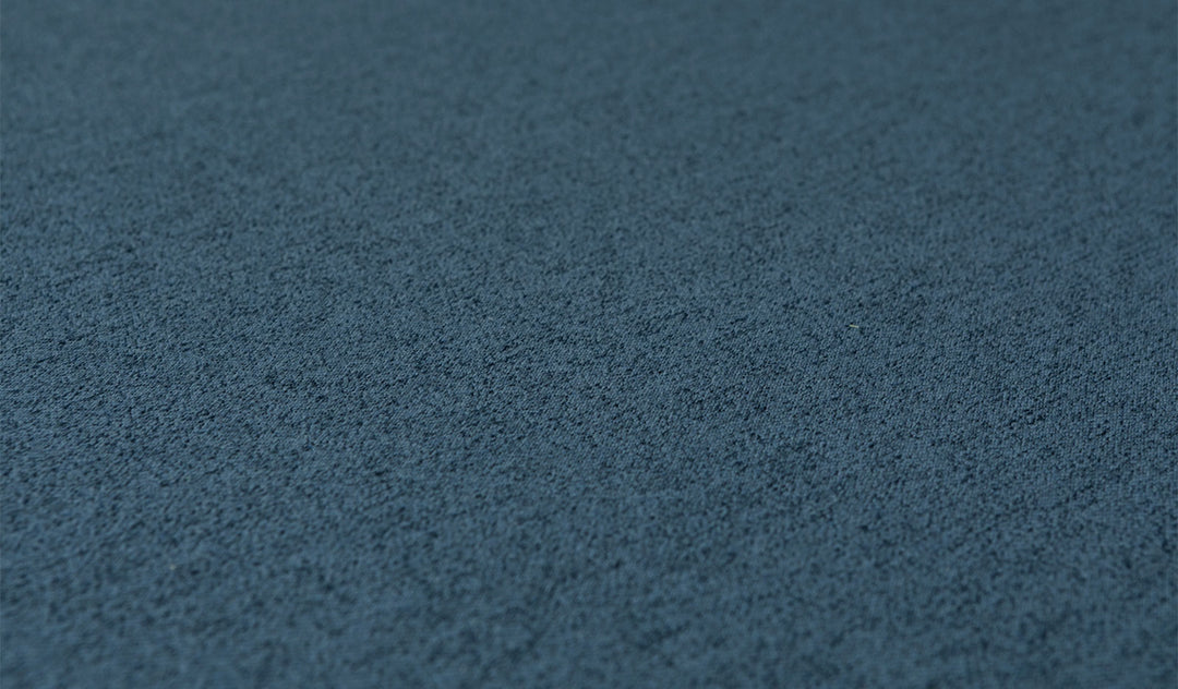 Close-up of the luxe texture of Nugget's double-brushed microsuede fabric in dark-wash denim Buckaroo.