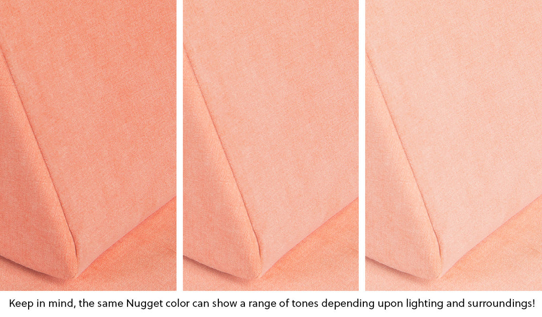 Close-up of a Nugget pillow in Blossom light peach across three lighting situations. One color can present as a range of tones depending on the room.