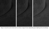 Close-up of a Chunk puck in Catwalk all-black across three lighting situations. One color can present as a range of tones depending on the room.