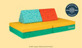 A bright, bold Crayola Nugget play couch set up in a kids' sofa configuration.