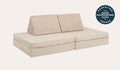 A Dunebuggy vintage beige Nugget play couch set up in a kids' sofa configuration.