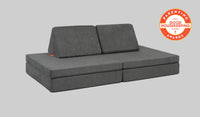 A Harbor charcoal gray Nugget play couch set up in a kids' sofa configuration.