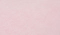 Close-up of the luxe texture of Nugget's double-brushed microsuede fabric in blush pink Heartthrob.