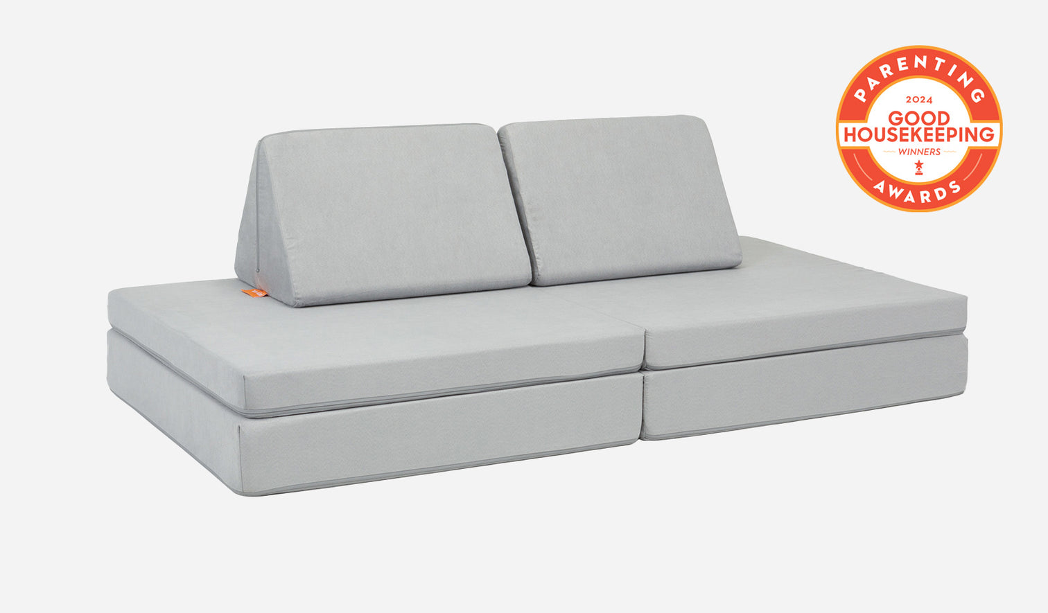 A Koala light gray Nugget play couch set up in a kids' sofa configuration.