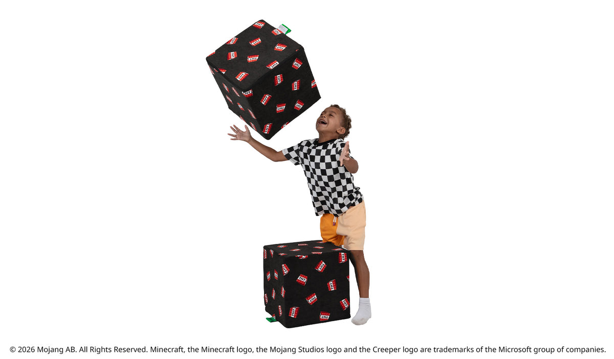 A child plays with the Minecraft TNT Blocks by Nugget®.