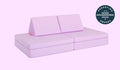 A Moonshot lilac purple Nugget play couch set up in a kids' sofa configuration.