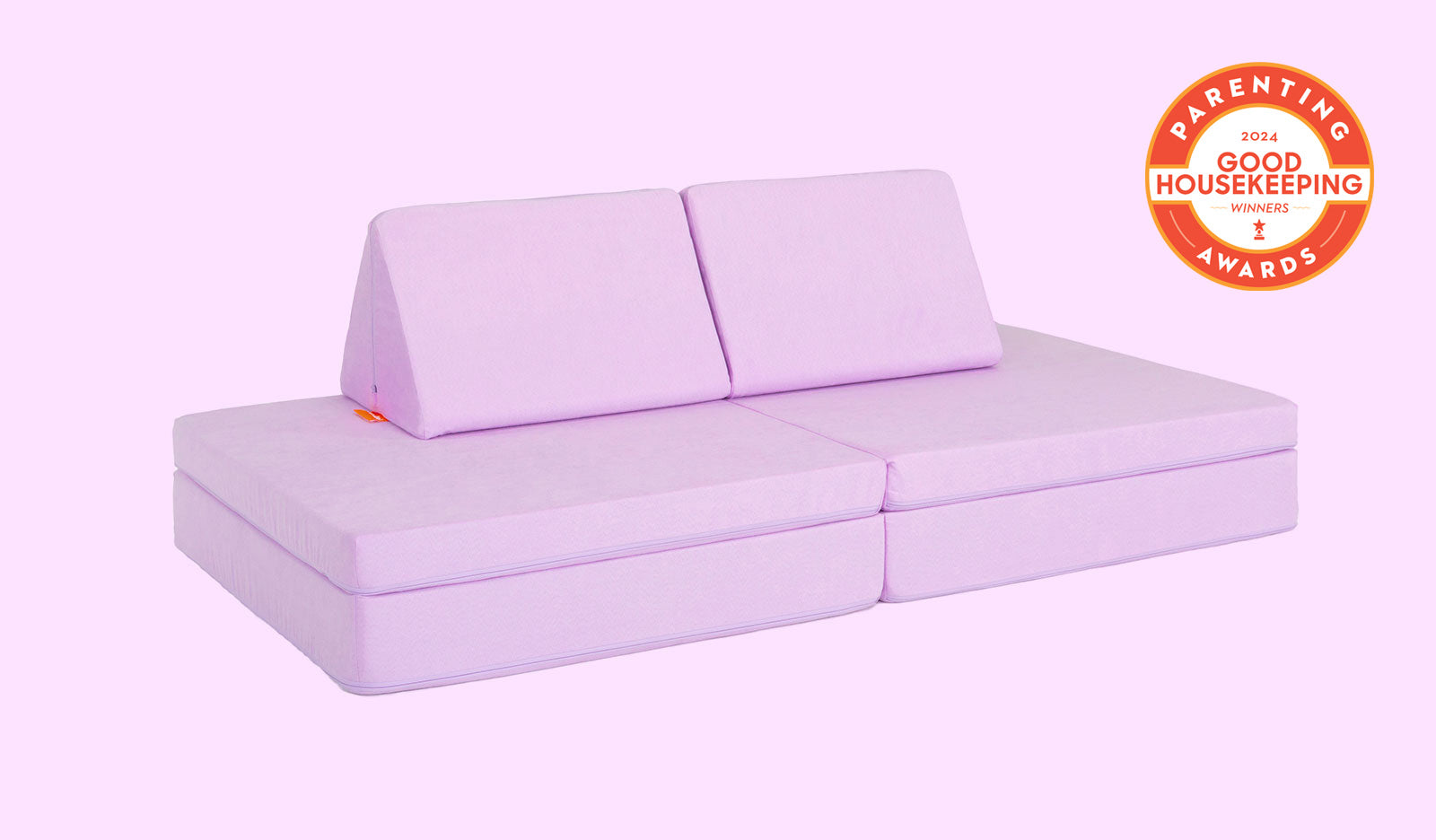 A Moonshot lilac purple Nugget play couch set up in a kids' sofa configuration.
