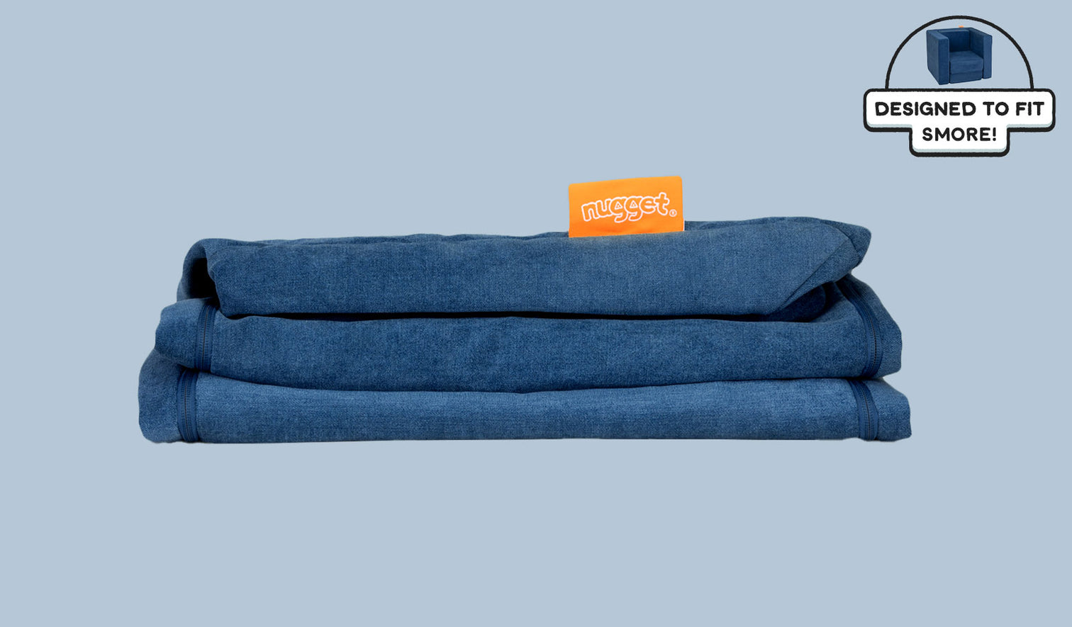 A neatly folded and stacked Smore Cover Set in navy blue Blueridge.