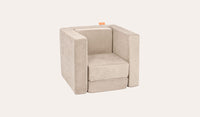 A Dunebuggy vintage beige Smore play chair set up in a kids' chair configuration.