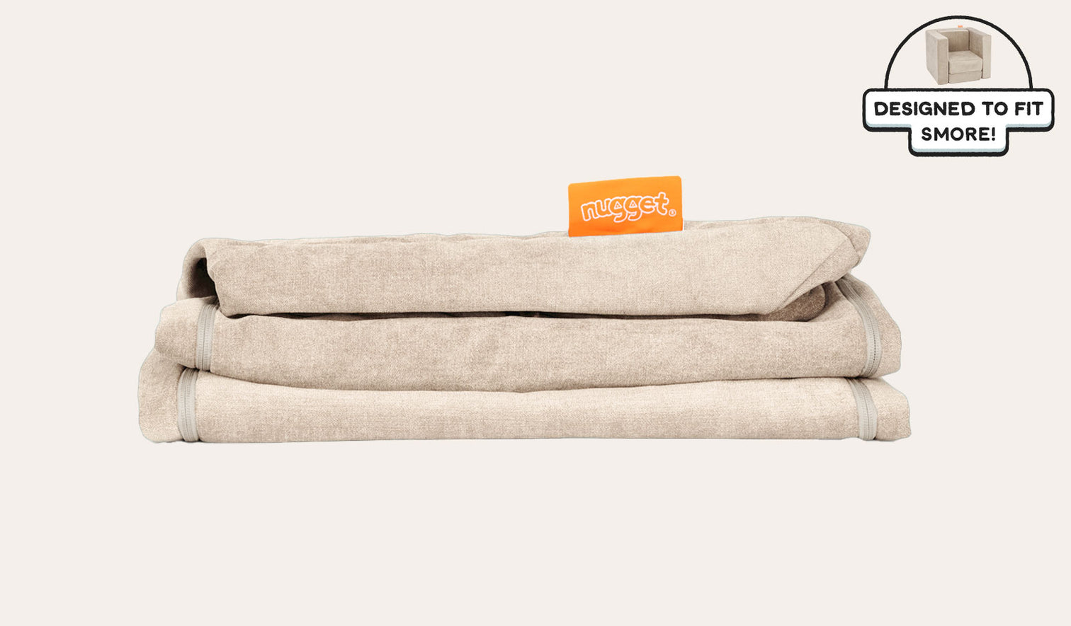A neatly folded and stacked Smore Cover Set in vintage beige Dunebuggy.