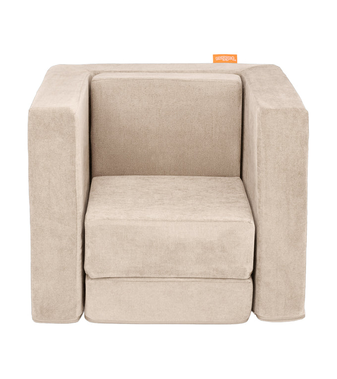 A Dunebuggy vintage beige Smore play chair set up in a kids' chair configuration, which can be customized with an embroidered name.