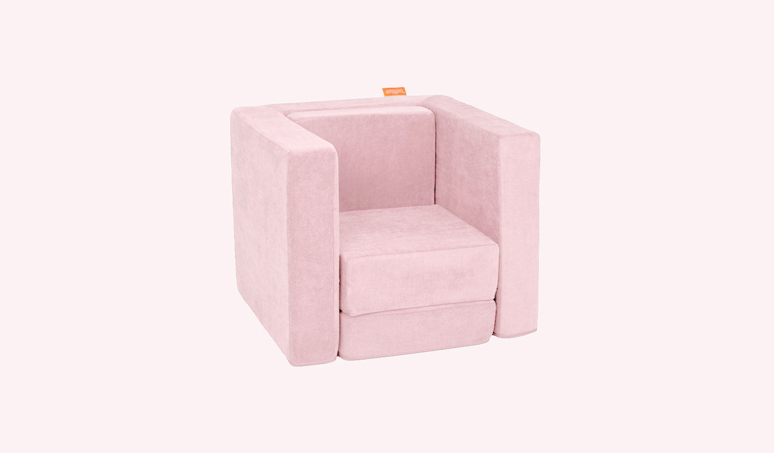 A Heartthrob blush pink Smore play chair set up in a kids' chair configuration.