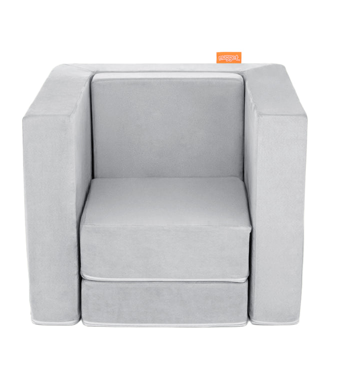 A Koala light gray Smore play chair set up in a kids' chair configuration, which can be customized with an embroidered name.