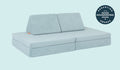 A Surfside light gray-blue Nugget play couch set up in a kids' sofa configuration.