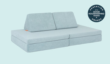 A Surfside light gray-blue Nugget play couch set up in a kids' sofa configuration.
