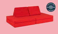 A Trolley true red Nugget play couch set up in a kids' sofa configuration.