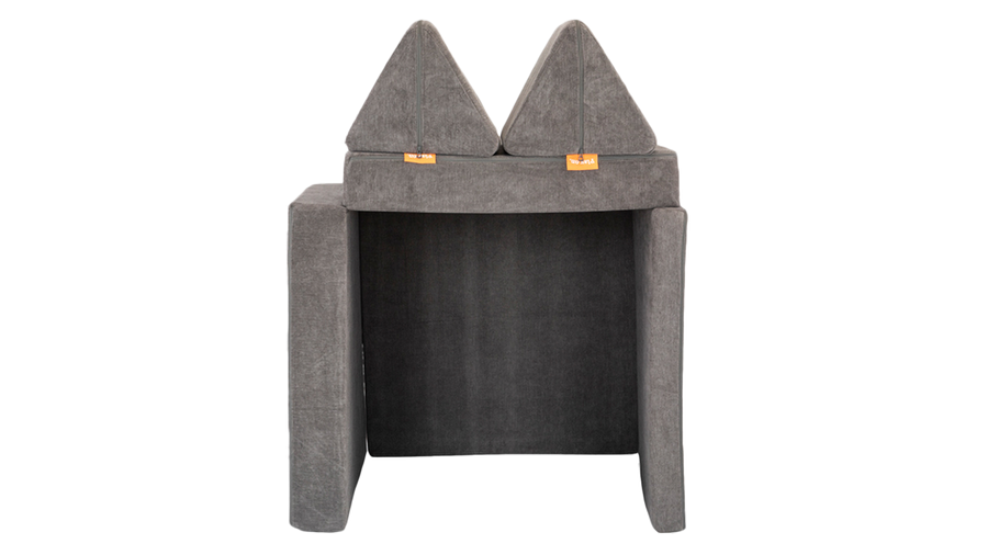 A classic Nugget fort build is ready for creativity — made using one charcoal gray Nugget play couch.