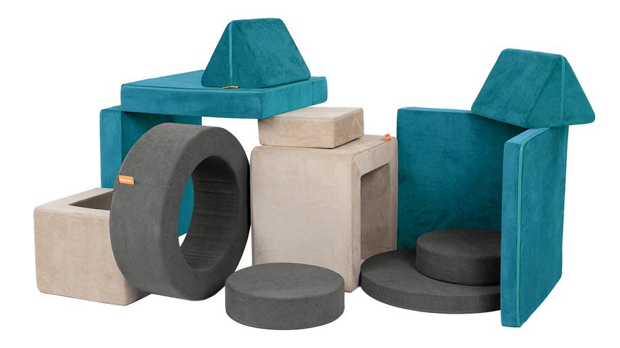 A teal Nugget, beige Smore, and dark gray Chunk are arranged into an elaborate fort with many nooks and crannies.
