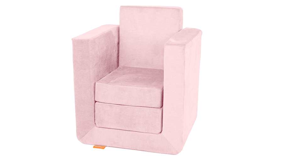 The three pieces of a blush pink Smore play chair are arranged into a tall chair.