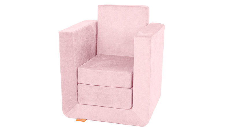 The three pieces of a blush pink Smore play chair are arranged into a tall chair.
