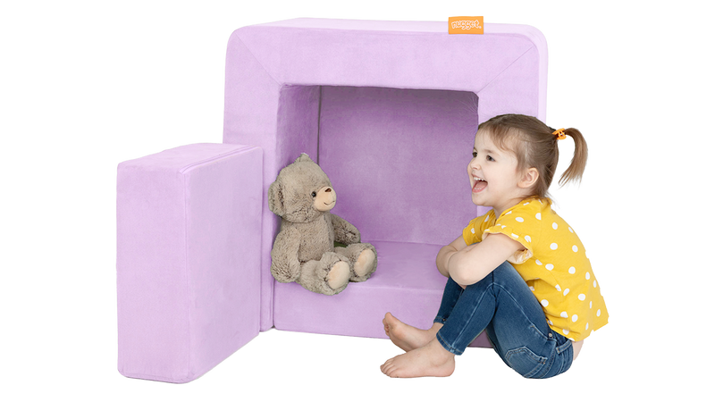 A child plays with a stuffed animal, perched in the pieces of a lavender purple Smore play chair.