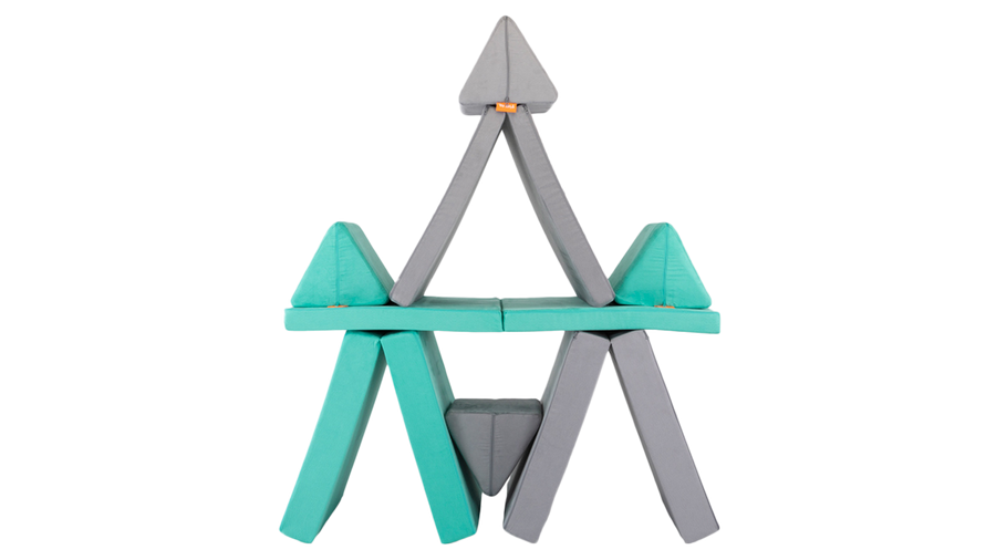 Two Nugget play couches are set up as a pyramid build, with four compartments for stashing toys and stuffies.