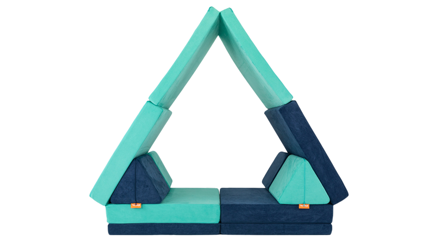 A high-ceilinged tent is constructed using two Nugget play couches.