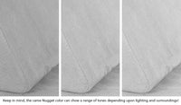Close-up of a Nugget pillow in Koala light gray across three lighting situations. One color can present as a range of tones depending on the room.